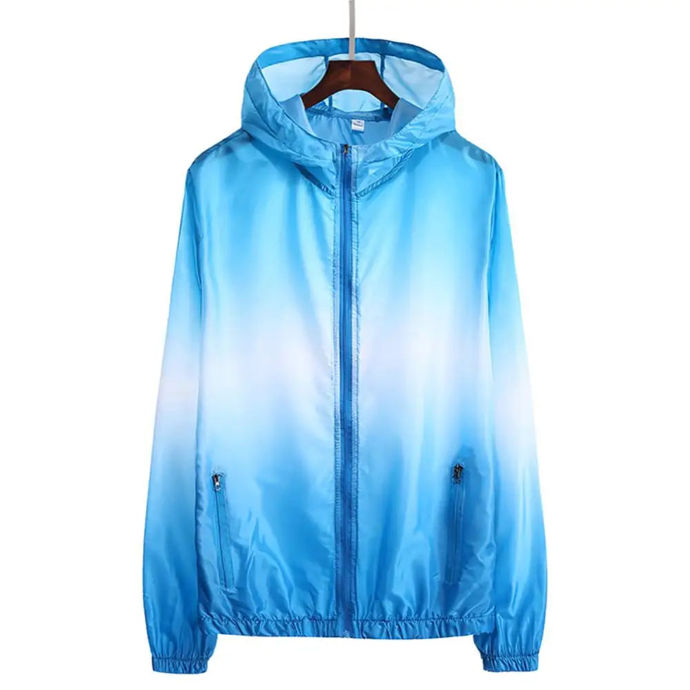 Unisex solar protection jacket by Corporación Turística with a storage pouch, shown in a versatile outdoor setting.