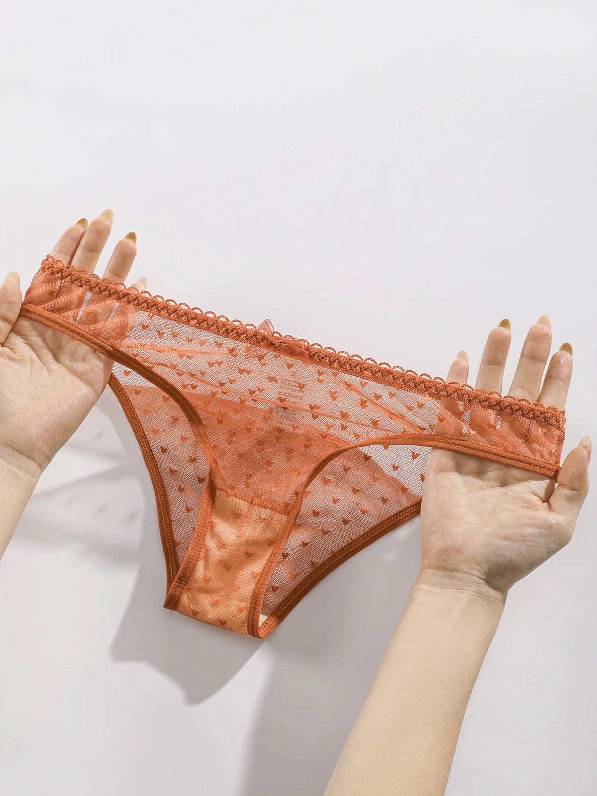 Set of 7 simple, comfortable triangular bras by Corporación Turística, featuring soft fabric and a minimalist design.