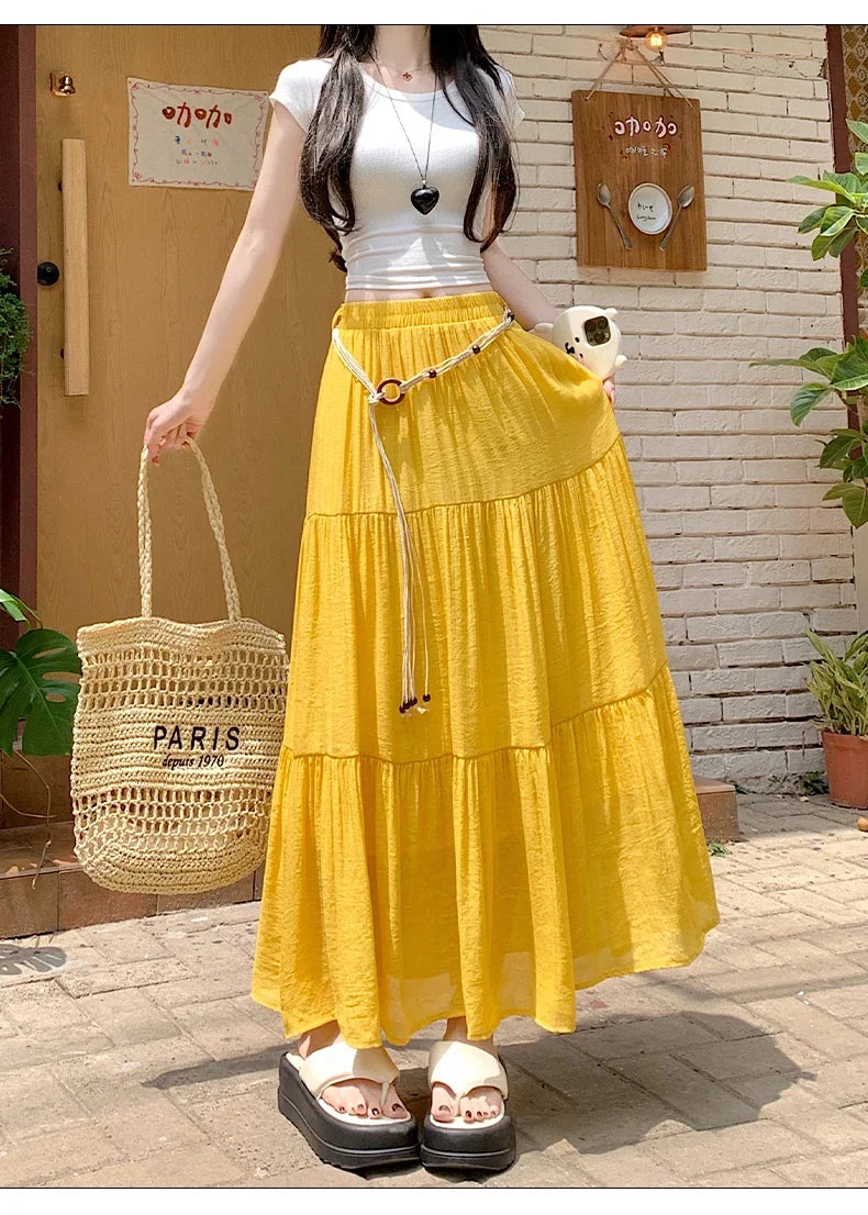 Long boho midi skirt made of cotton and linen, featuring a relaxed summer design, ideal for casual warm-weather wear.