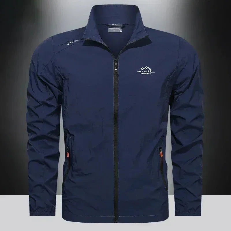 Chaqueta UPF100+ Verano Hombre: Cortavientos UV Ultraligero con Bolsillos - Corporación Turística