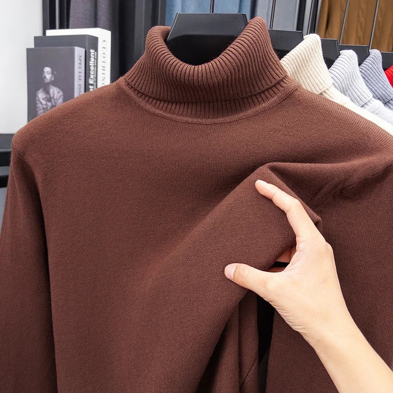 Blue men's high-neck winter sweater by Corporación Turística, chunky knit, premium quality, perfect for fall and winter wear.
