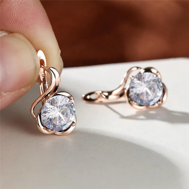 Rainbow cubic zirconia floral mystical earrings with intricate flower design, crafted by Corporación Turística.