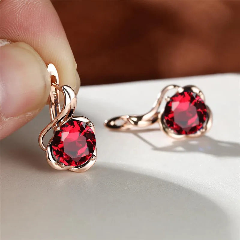 Rainbow cubic zirconia floral mystical earrings featuring vibrant flower designs by Corporación Turística.