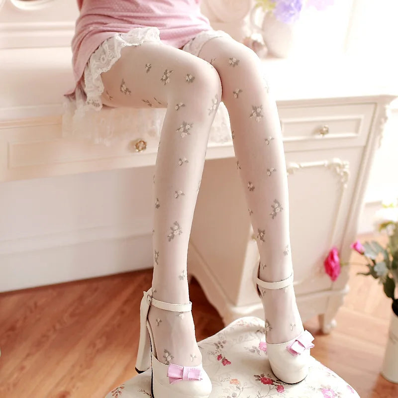 Elegant floral embroidered pantyhose for women made of imitation silk, featuring intricate embroidered floral patterns.