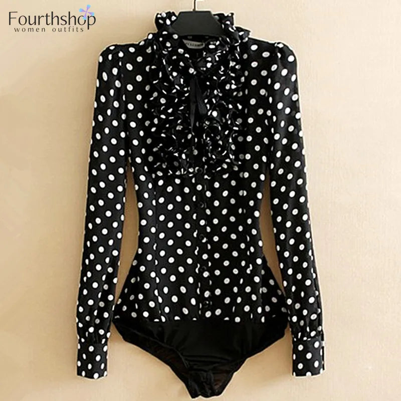 Black women's bodycon shirt with polka dot print from Corporación Turística, close-up of the fitted, stylish design.