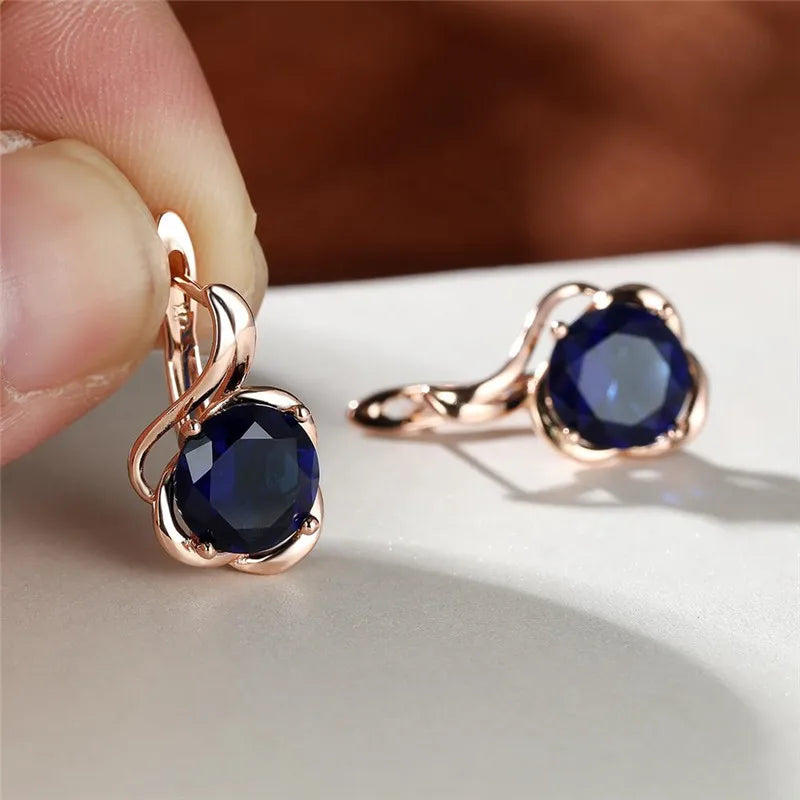 Rainbow cubic zirconia floral mystical earrings with vibrant colors, elegant jewelry by Corporación Turística.