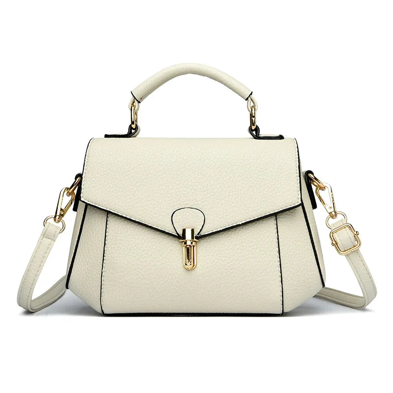Small high-quality women's shoulder bag from Corporación Turística, stylish bandolera with elegant design and durable material.