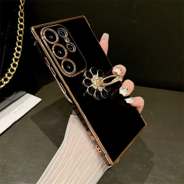 Samsung Galaxy S24 Ultra luxury metal ring case by Corporación Turística, featuring a shiny gold-plated edge and sleek design.