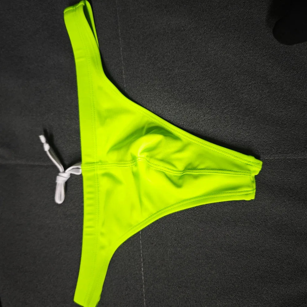 Various styles of 2026 wholesale swimsuits from Corporación Turística, featuring colorful fabrics and modern designs.