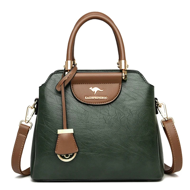 Small women's leather crossbody bag with shoulder strap, stylish and compact for everyday use by Corporación Turística.