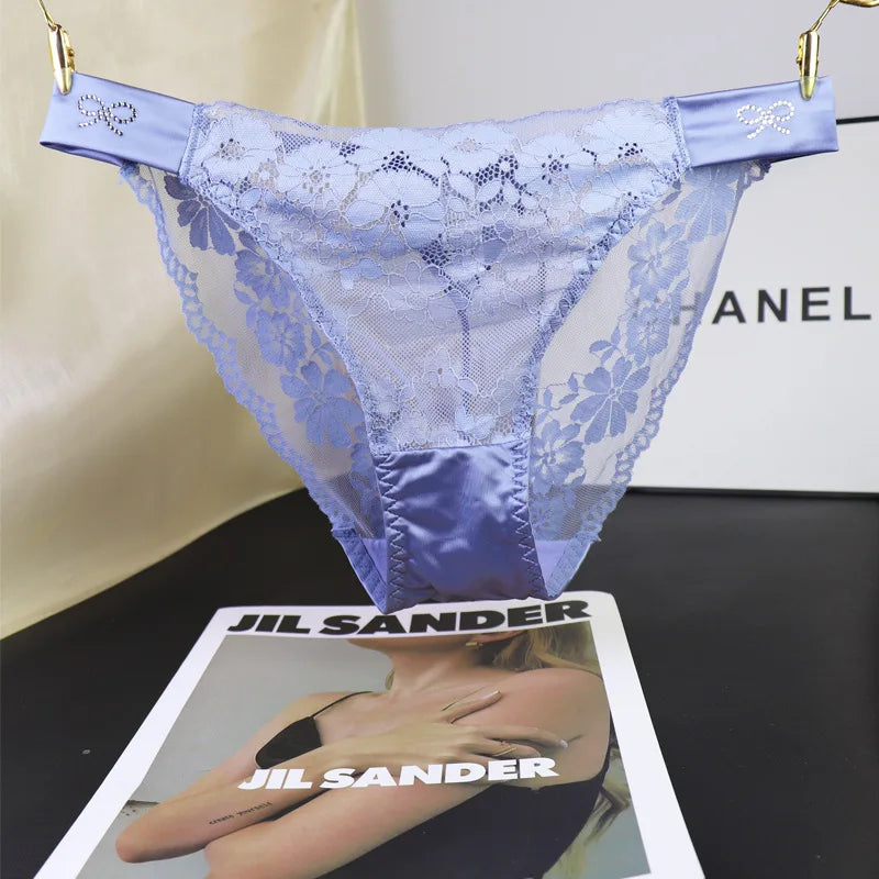 Set of three sexy French lace panties from Corporación Turística featuring delicate, sheer lace fabric in a stylish design.