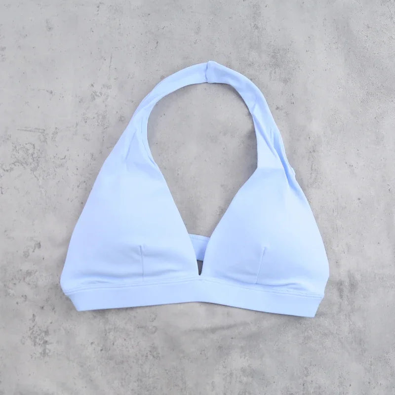 Sujetador deportivo para mujer con diseño de cuello halte...