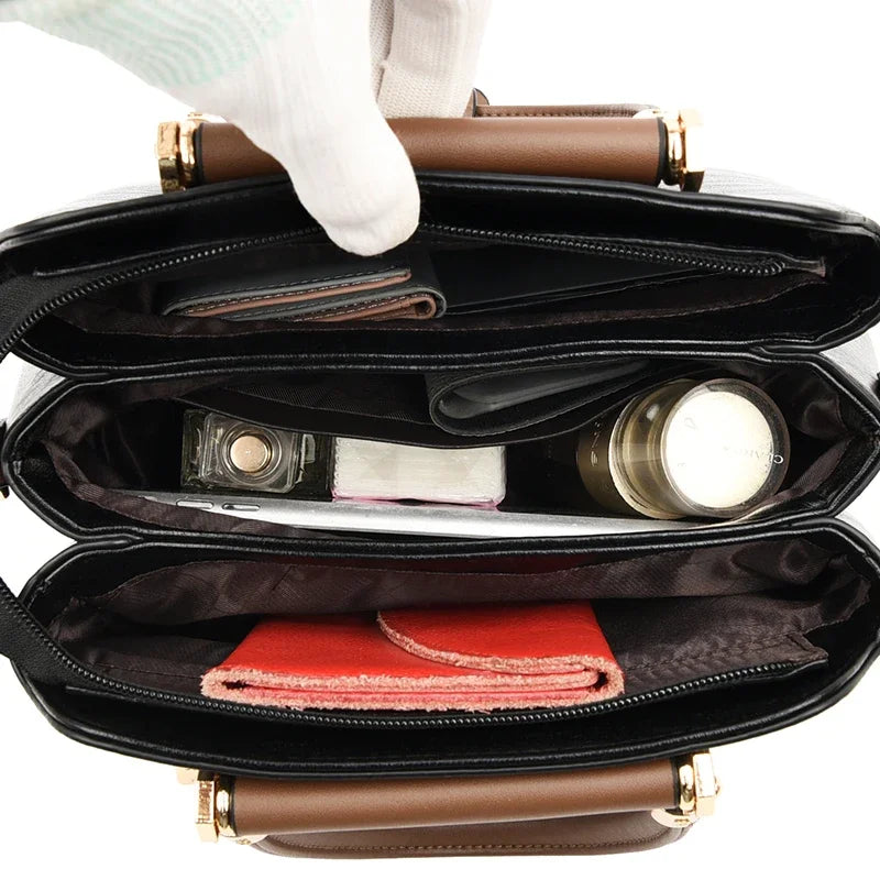 Small women's leather crossbody bag with shoulder strap, stylish and compact for everyday use.