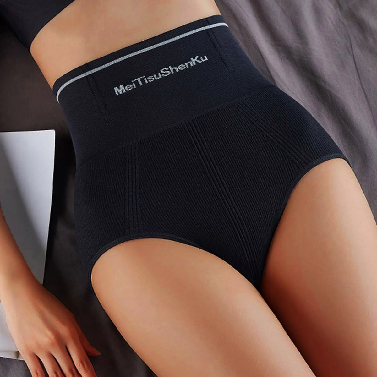 Postpartum belly control briefs for women by Corporación Turística, high-waisted shapewear for postpartum recovery.