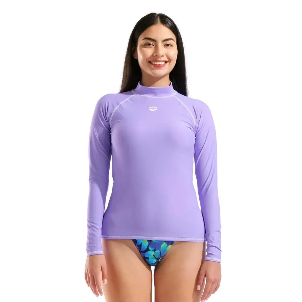 High-elasticity long-sleeve women's T-shirt by Corporación Turística, shown in a fitted style with soft fabric.