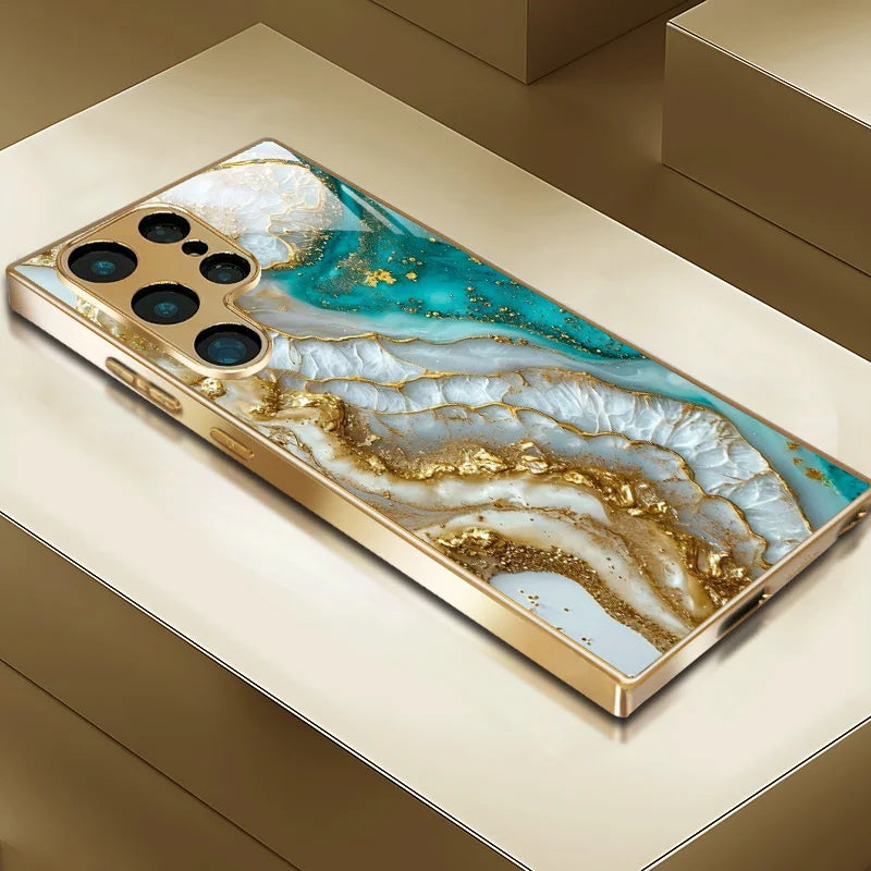Metallic painted glass phone case by Corporación Turística with artistic pattern, designed to protect and decorate smartphones.