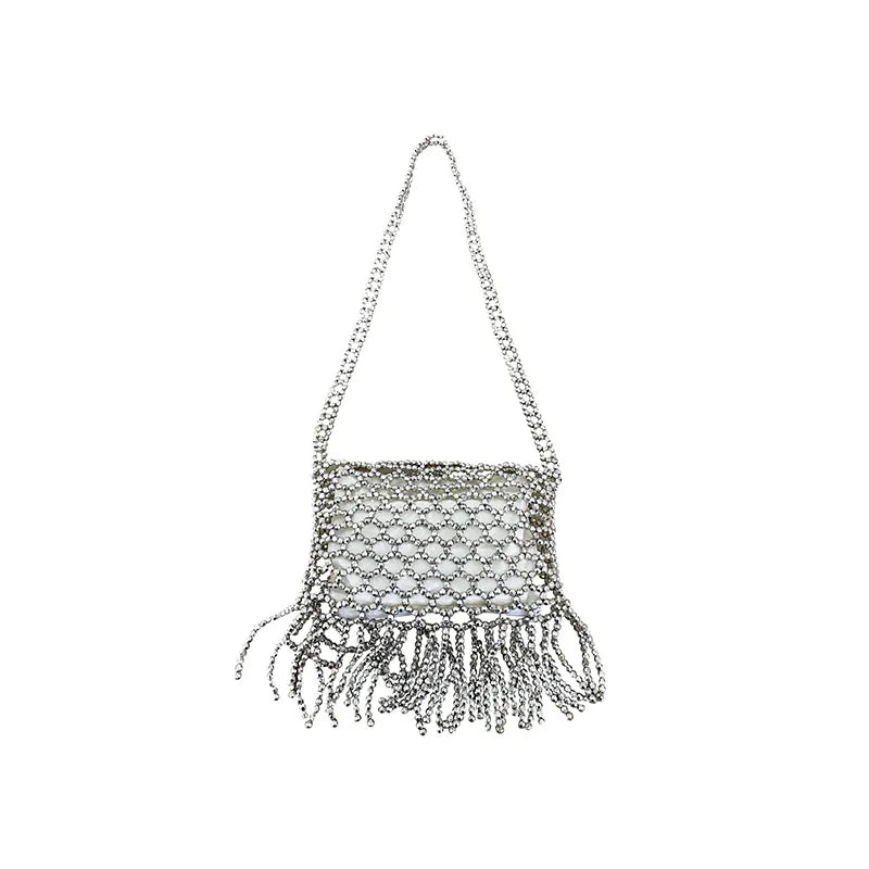 Handmade woven bag with beads and tassels, featuring colorful textile design, by Corporación Turística.