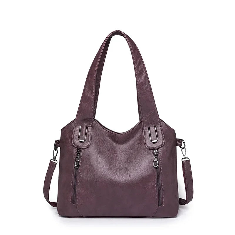 Colorful solid women's fashion handbags by Corporación Turística, stylish and versatile handheld purses for everyday use.