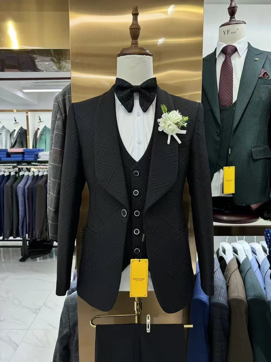 Elegant groom wedding suit from Corporación Turística, high-quality fabric, tailored fit, suitable for formal wedding ceremonies.