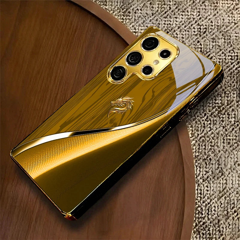 Gold galvanized phone case featuring a dragon design, designed to protect and decorate smartphones with a mythical motif.