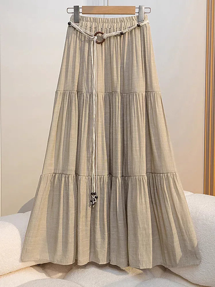 Light-colored boho midi summer skirt made of cotton and linen, featuring a long flowing design by Corporación Turística.