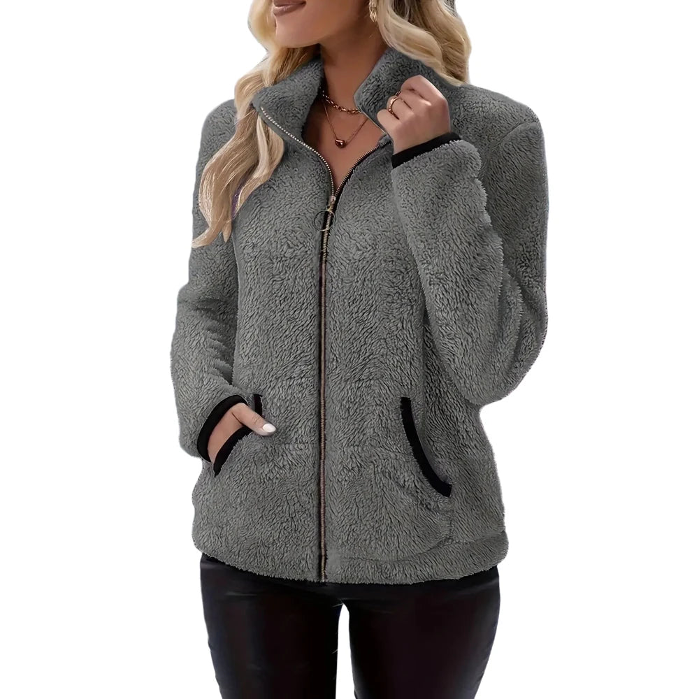 Women's full-zip fleece jacket by Corporación Turística featuring soft fabric and a comfortable fit, shown in a front view.