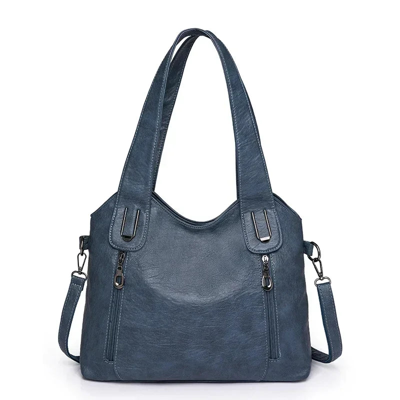 Solid color fashion women's handbag by Corporación Turística, stylish and versatile for everyday use.
