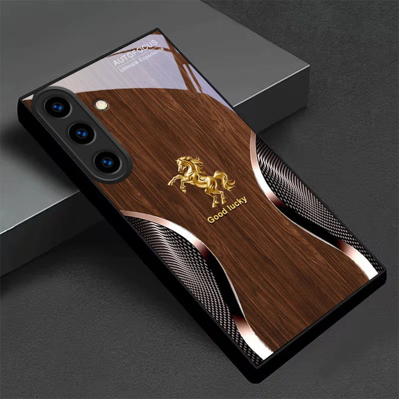 Black crystal phone case with gold steed design from Corporación Turística, stylish protective cover for smartphones.