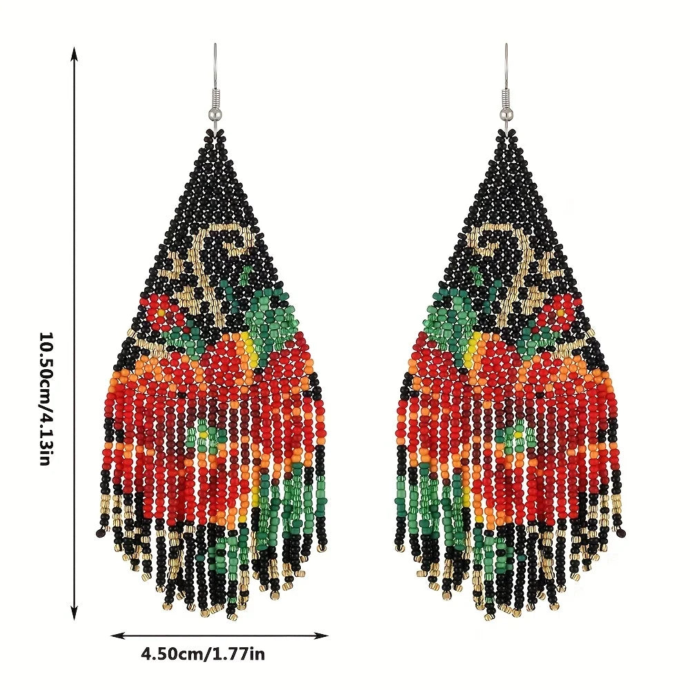 Three-dimensional bohemian-style earrings with colorful tassels and intricate design, perfect for a trendy, artsy look.