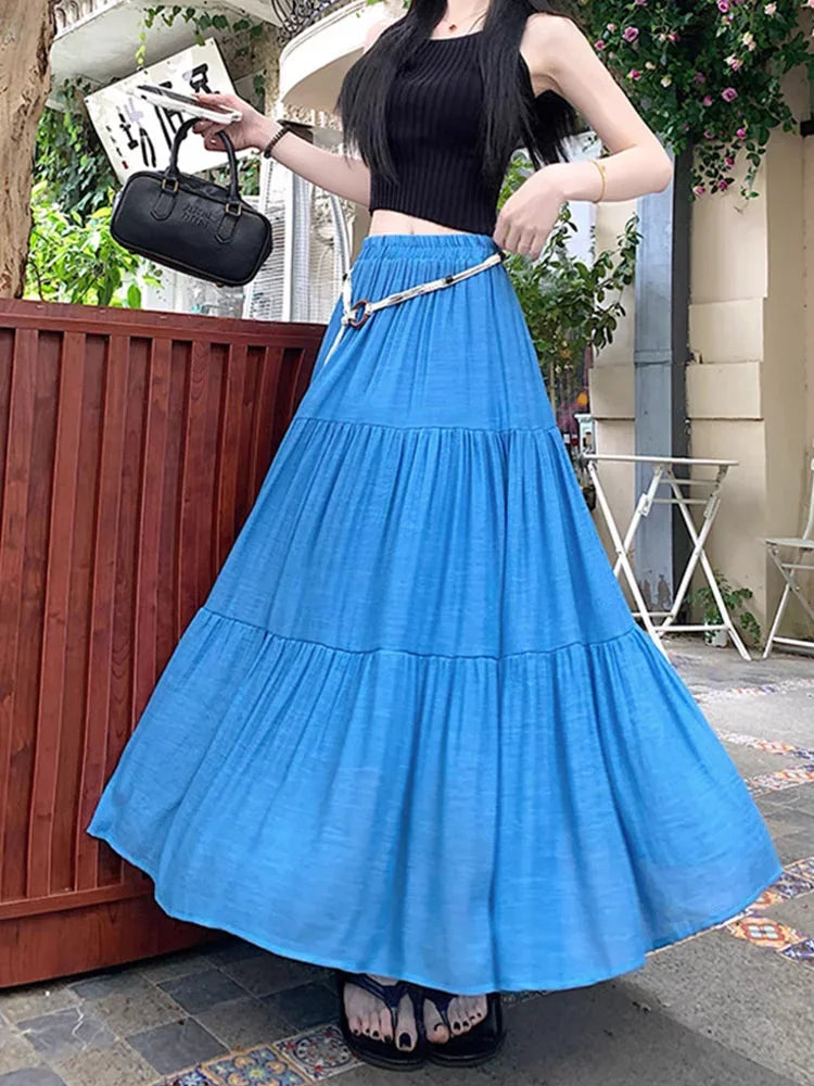 Long boho midi summer skirt made of cotton and linen by Corporación Turística, featuring a flowing, relaxed design.