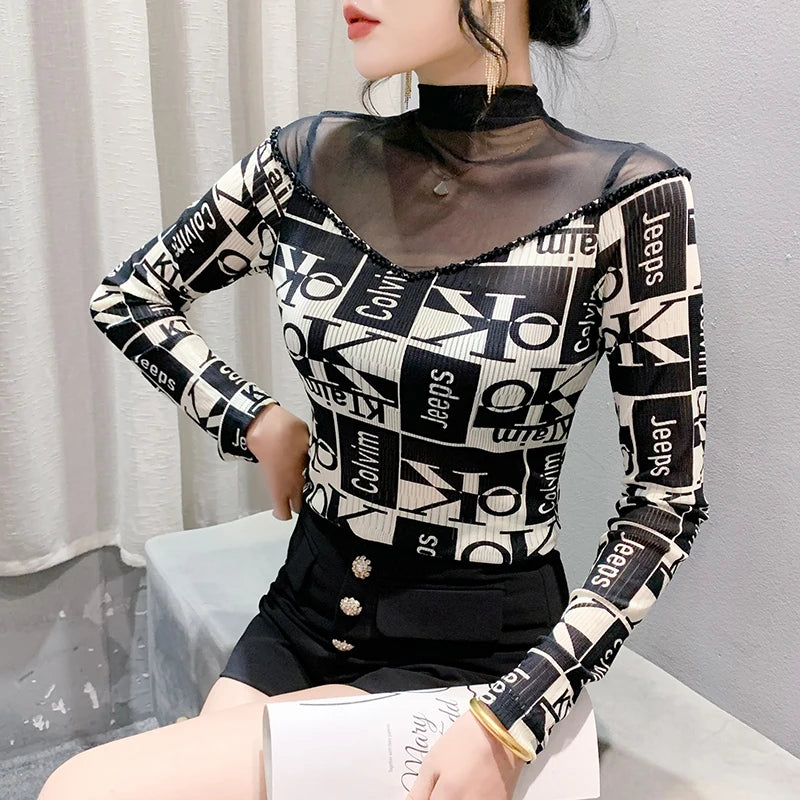 European 2025 autumn winter T-shirt from Corporación Turística, displayed flat with neutral background and visible branding details.