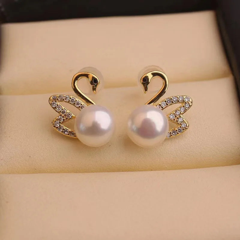 Pendientes de cisne de cristal hueco de aguja de plata 92...