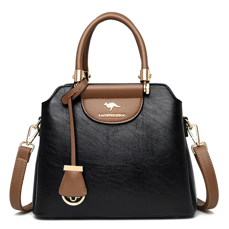 Small women's leather crossbody bag with adjustable strap, black leather, from Corporación Turística, perfect for everyday use.