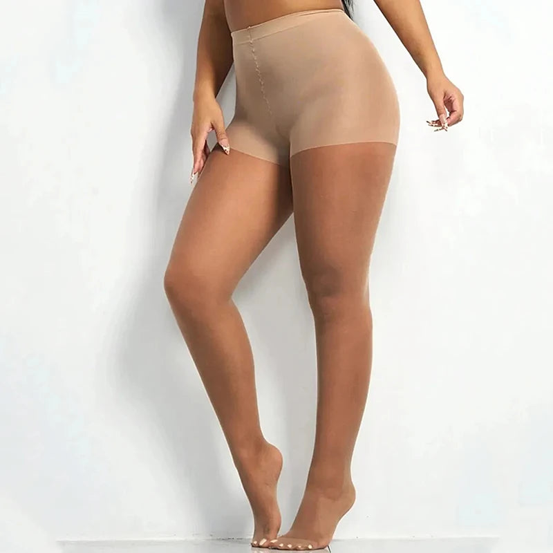 Pair of solid transparent 40D pantyhose from Corporación Turística, showcasing smooth, sheer hosiery with a comfortable fit.