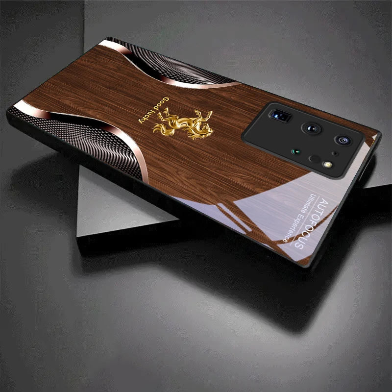 Black crystal Golden Steed Fortune phone case by Corporación Turística with intricate gold detailing and elegant design.