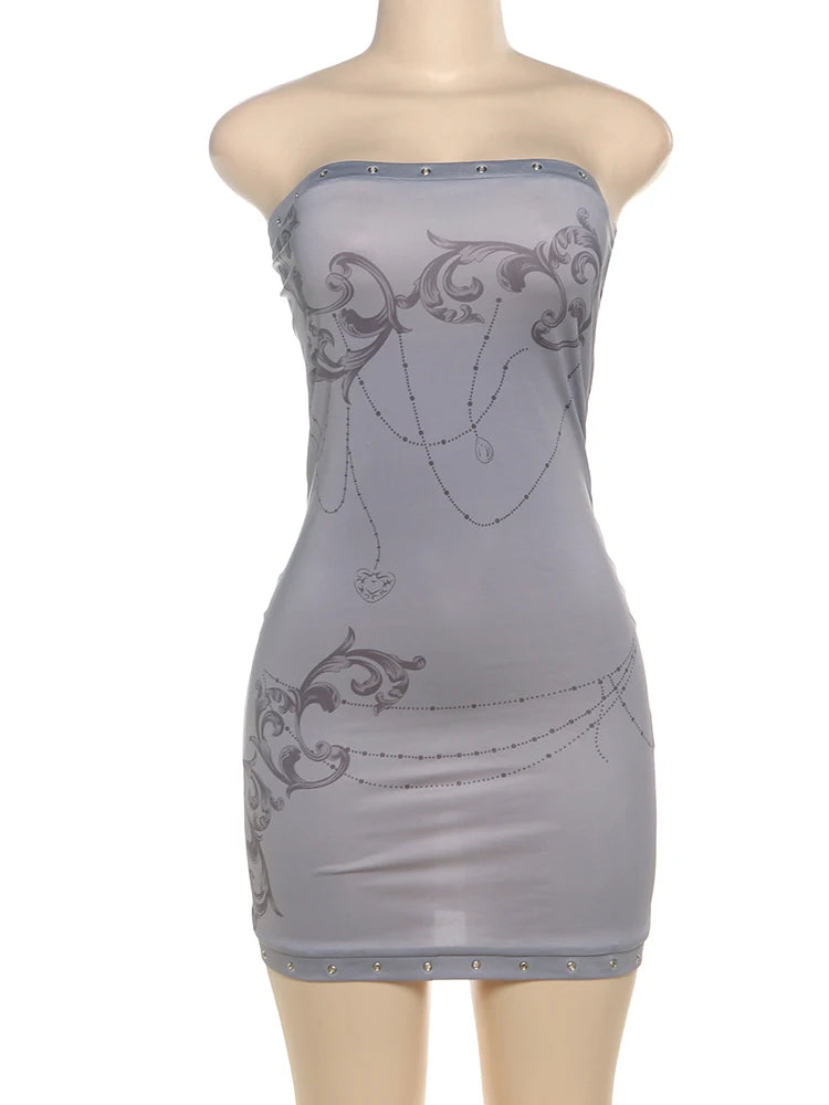 Sexy dress with metal cat ring accents, featuring a stylish design perfect for fashionable outings.