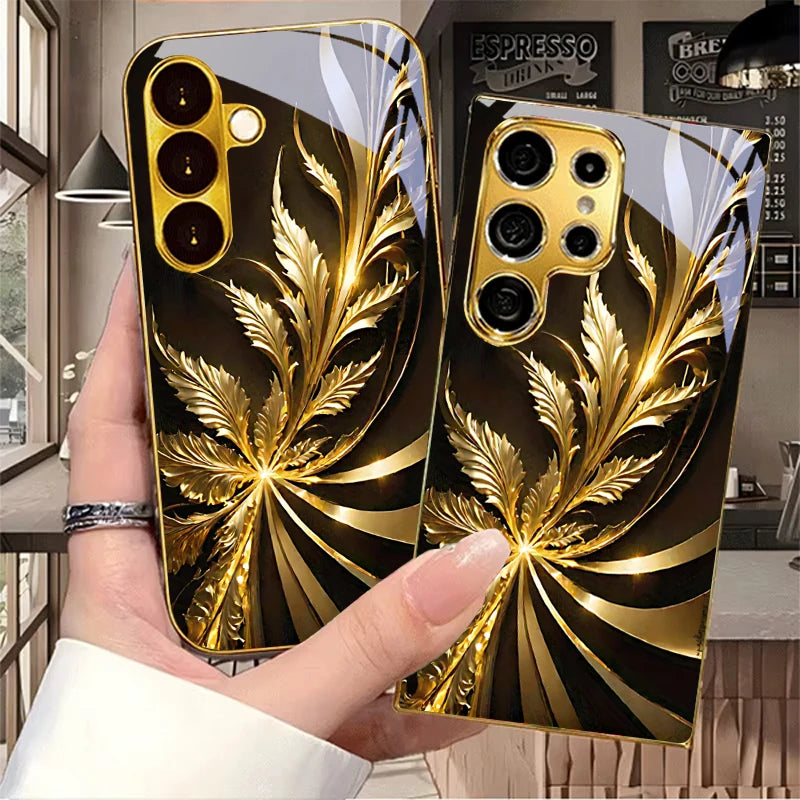 Golden phone case with radiant foliage design, showcasing intricate leaf patterns on a sleek, stylish protective cover.