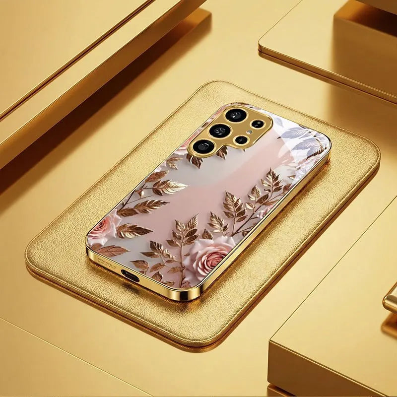 Galvanized glass phone case with floral pattern, designed for smartphones, featuring a protective and decorative design.