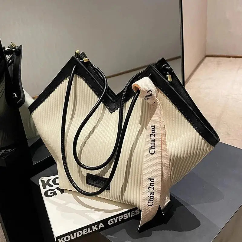 Large Korean style women's tote bag made of durable canvas with spacious interior and stylish design.