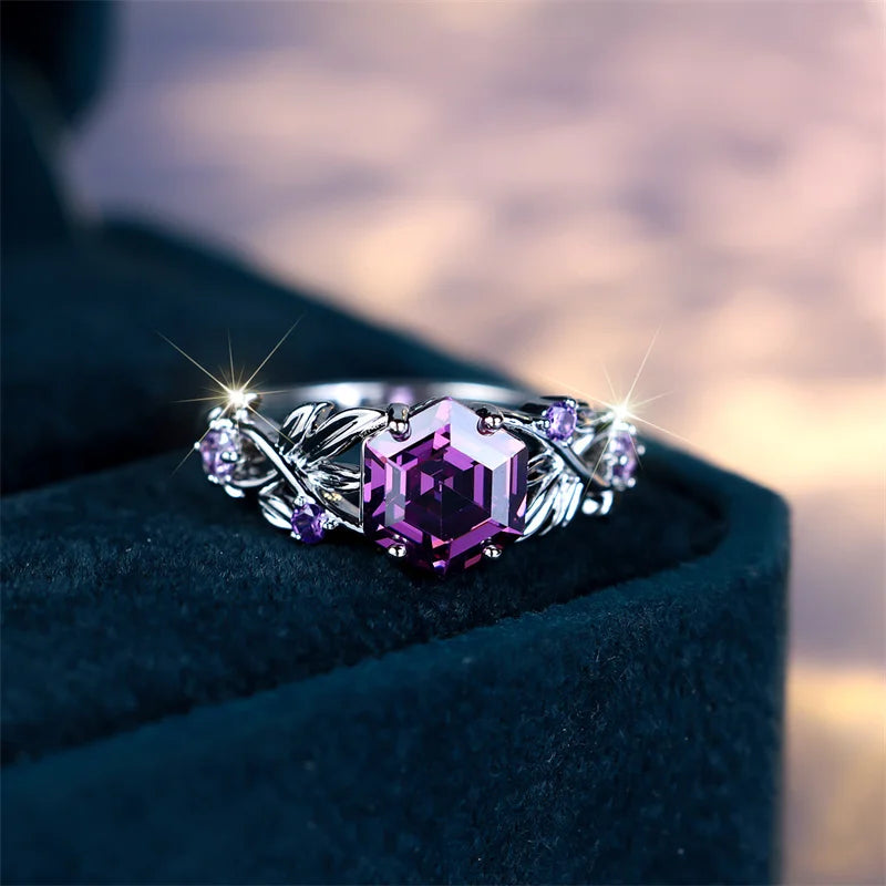 Anillo giratorio de circón hexagonal con incrustaciones d...
