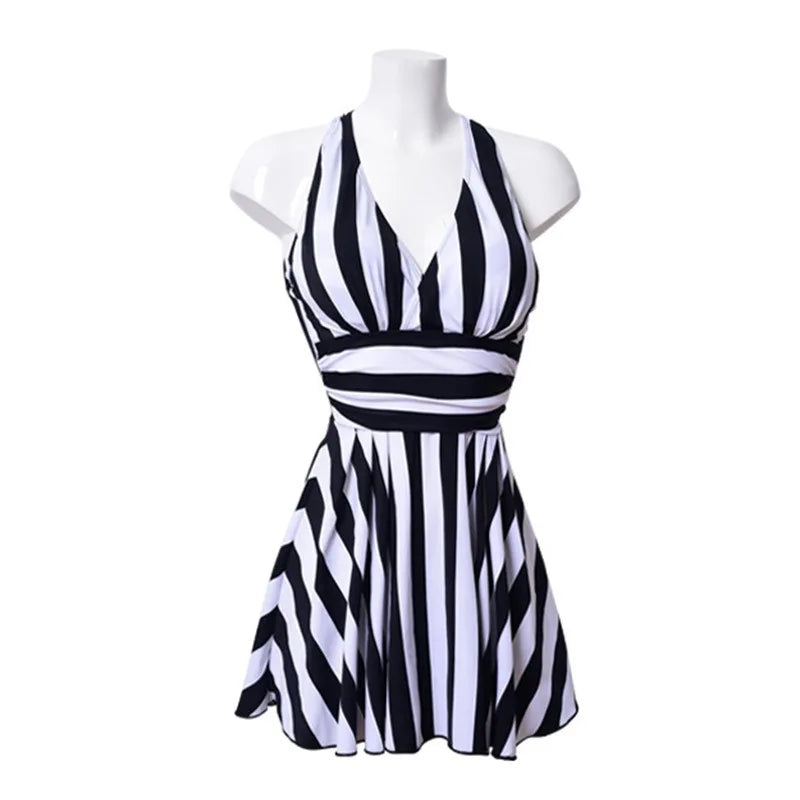 High-end one-piece swimsuit by Corporación Turística, featuring a stylish design perfect for beach or poolwear.