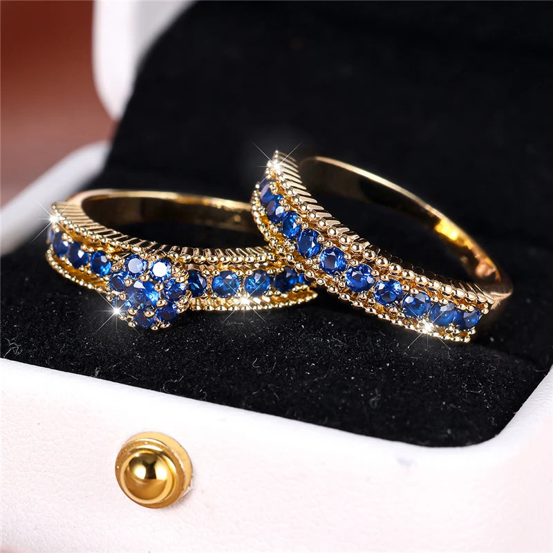 Conjunto de anillos de compromiso de piedra de circón azu...
