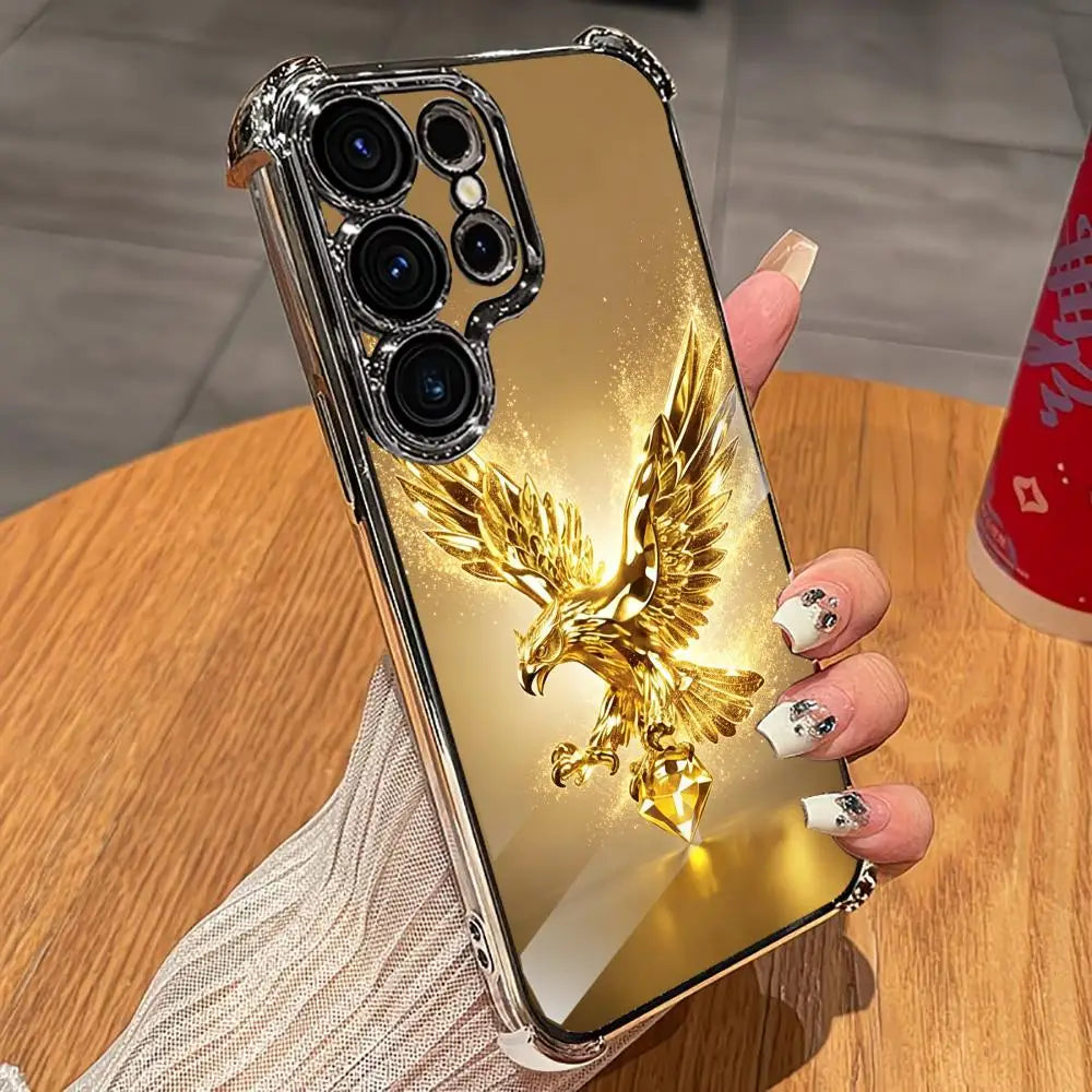 Gold eagle design phone case by Corporación Turística, featuring a shiny, decorative protective cover for smartphones.