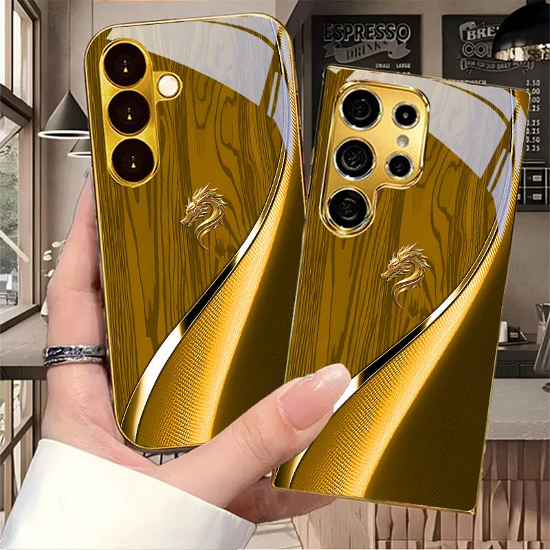 Golden galvanized phone case featuring a dragon design by Corporación Turística, stylish and protective for smartphones.