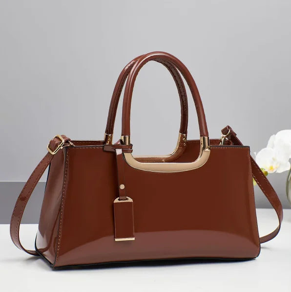 Western-style women's shoulder bag by Corporación Turística, featuring leather accents and rustic design details.