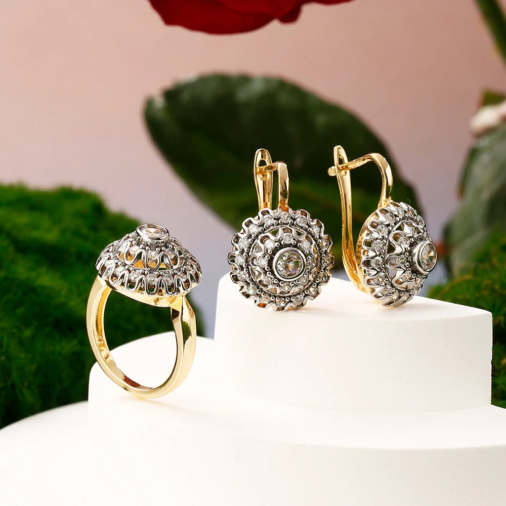 Vermiculite earrings with cone inlays from Corporación Turística, showcasing intricate design and natural mineral textures.