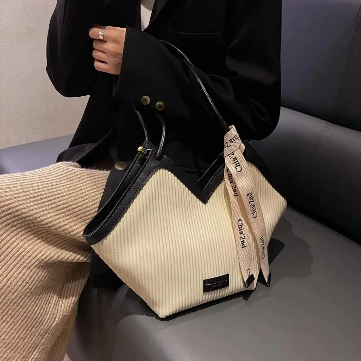 Large Korean-style women's tote bag made of durable canvas with stylish design, perfect for casual or everyday use.