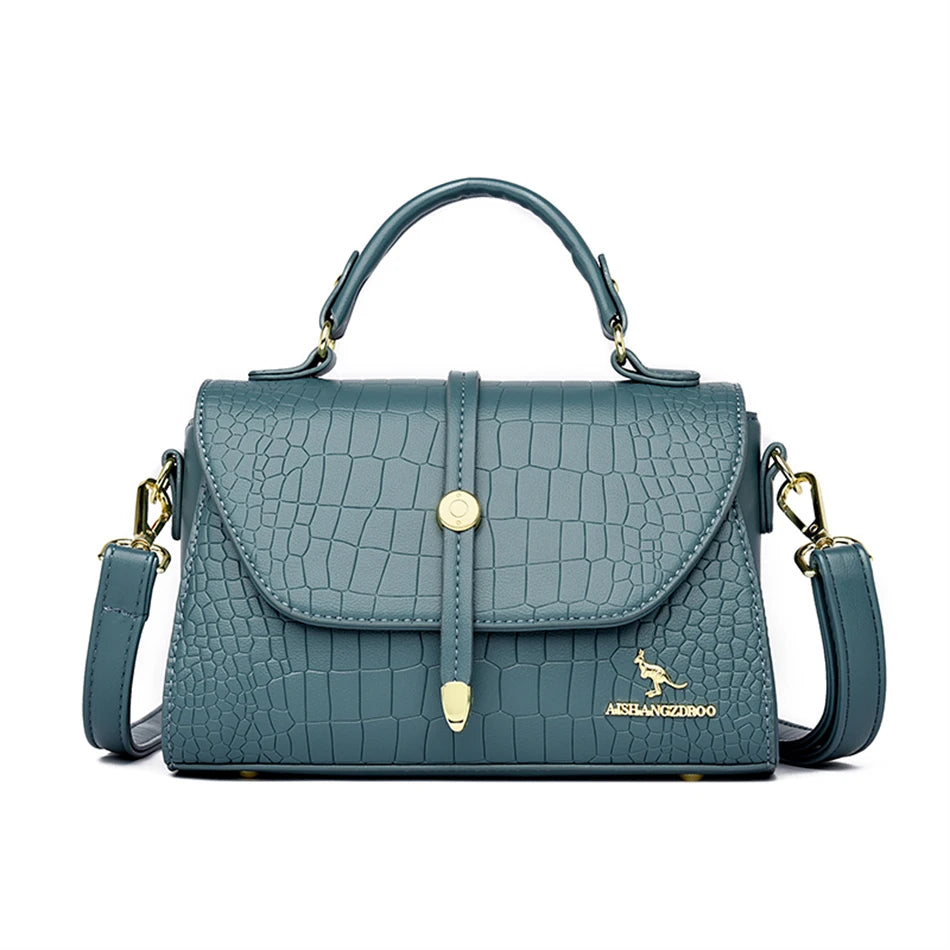 Crocodile leather crossbody bag by Corporación Turística, stylish 2024 fashion accessory with textured crocodile pattern