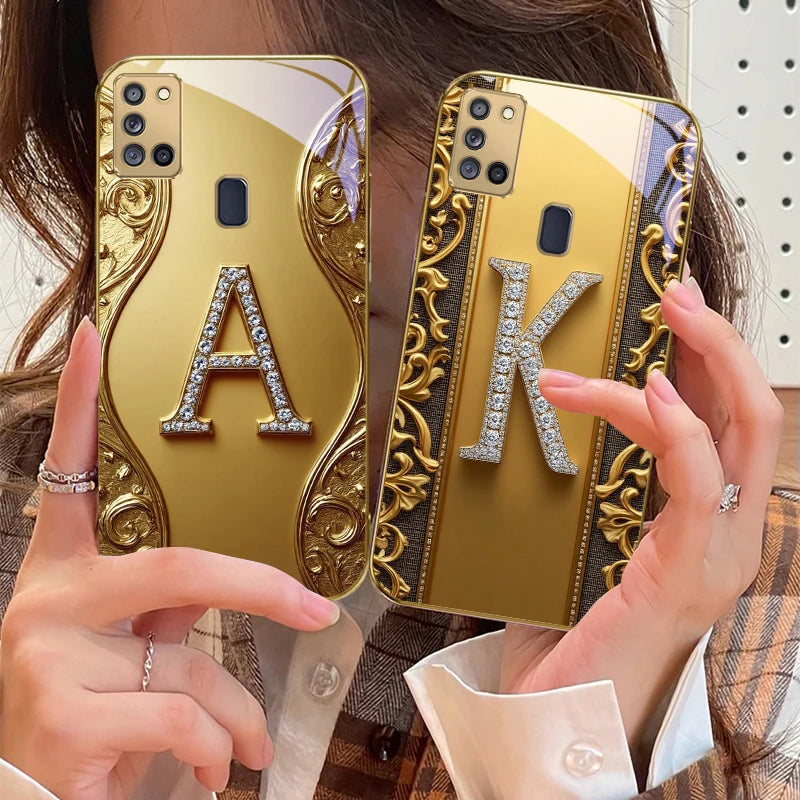 Clear gold crystal phone case with embedded diamonds, designed for a luxurious look and durable protection.