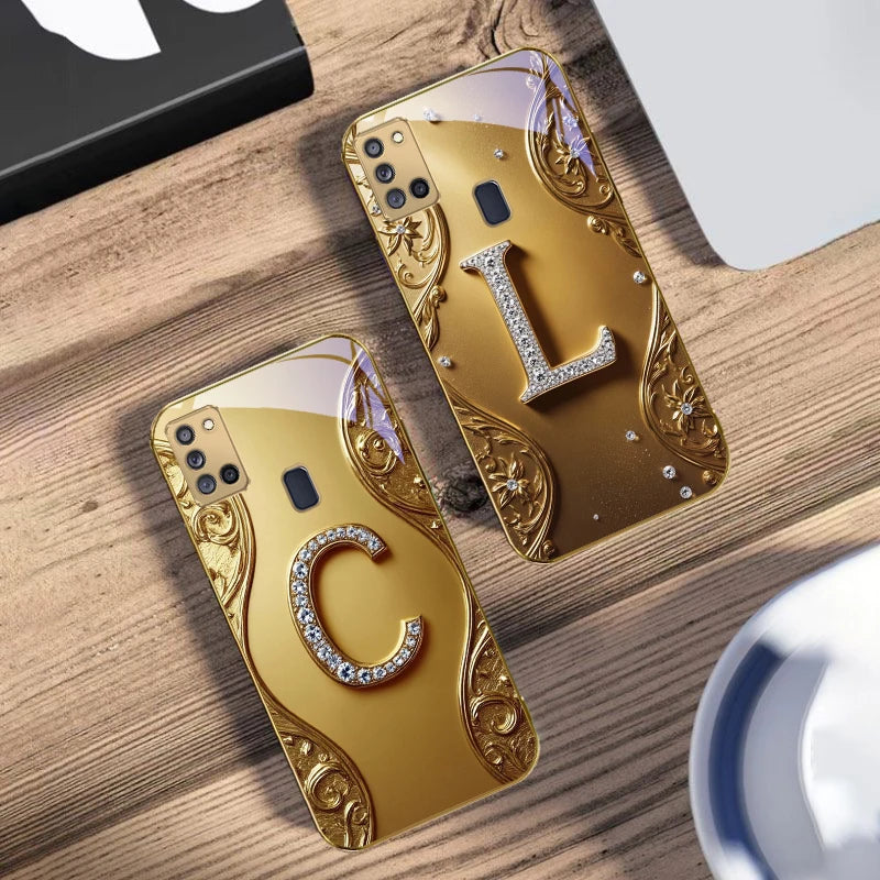 Gold crystal phone case with diamond accents, designed by Corporación Turística, showcasing its elegant, sparkling protective design.